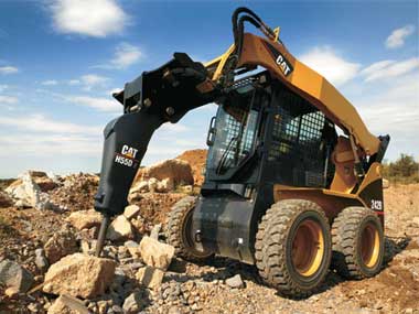 CAT Skidsteer with Hammer Attachment CAT Skidsteer with Hammer Attachment