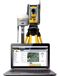 Surveying equipment and a laptop display construction technology software.
