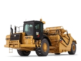Caterpillar wheel tractor-scraper shown against a white background.